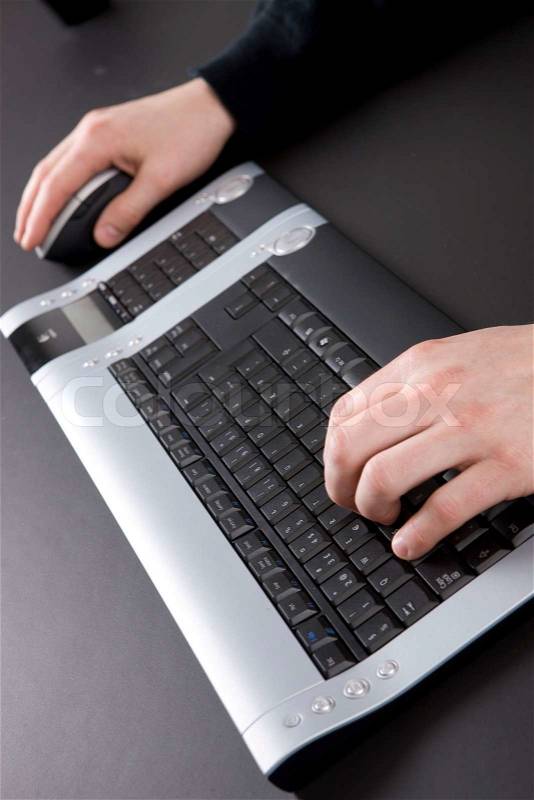 Hands on keyboard, stock photo