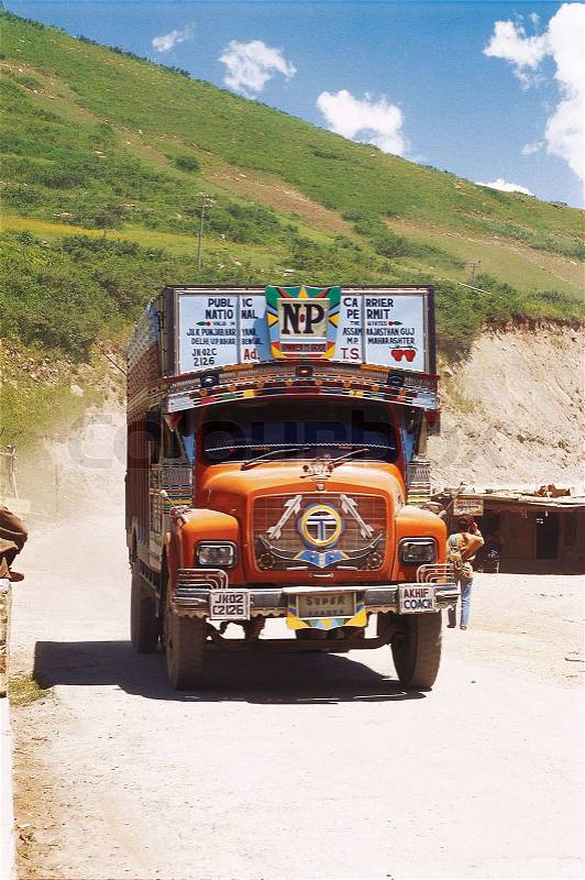 Jammu and Kashmir, India - June 17, 2002: Truck on Leh Highway also known as National Highway – 1D (NH – 1D) is the most reliable and one of the only two ways to reach Leh – Ladakh by road, stock photo