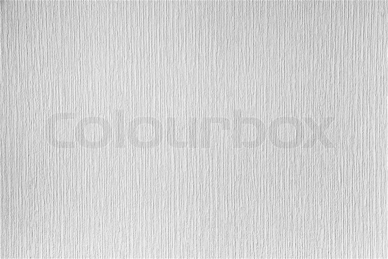 White paintable wallpaper on the wall. Clean background photo texture, stock photo