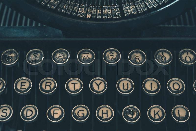 Retro Typewriter Closeup Photo. Vintage Damaged Typewriter, stock photo