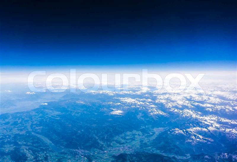 Landscape of Mountain. view from the airplane window . height of 10 000 km. view of blue sky, stock photo