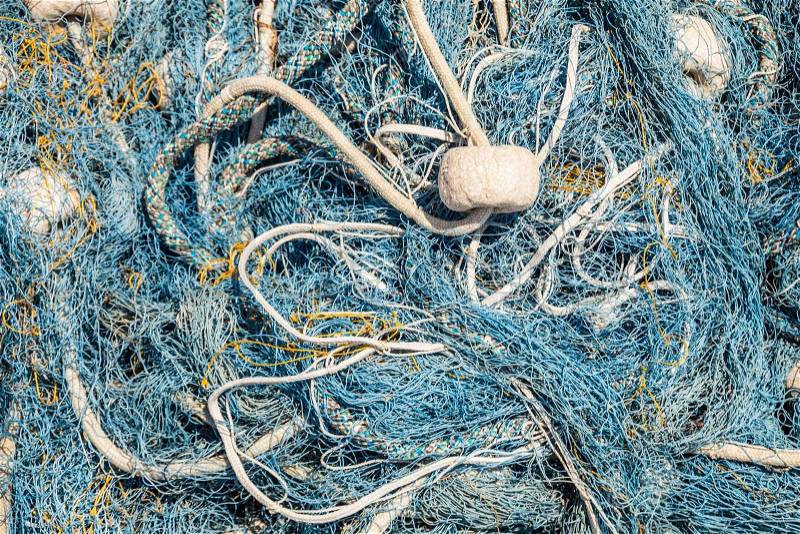 An image of blue fishing net used as a background, stock photo