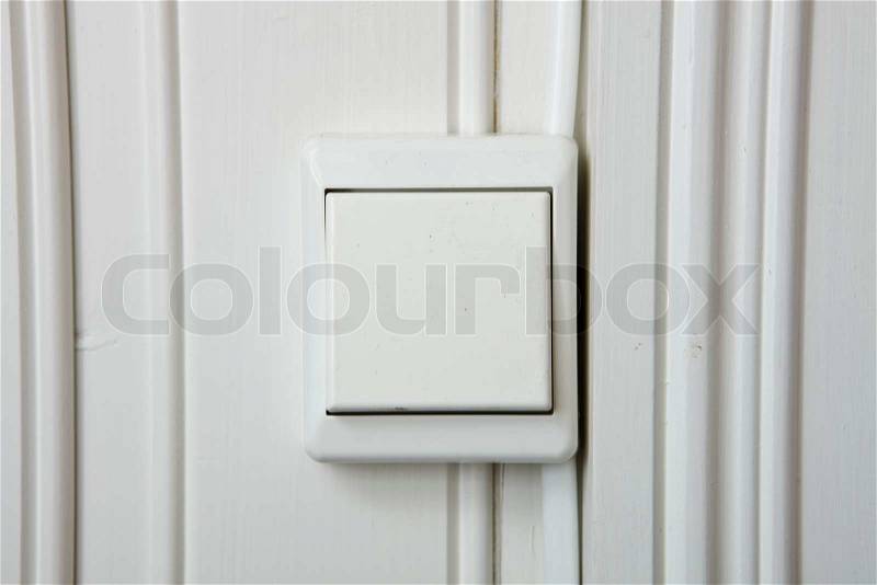Light button on the wall, stock photo