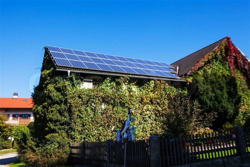 Solar cells on a residential house. solar power plant for alternative solar energy in the home., solar panels, symbol photo for alternative energy and sustainability, stock photo