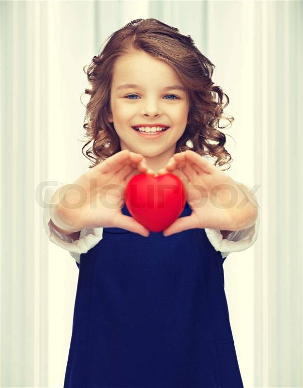 Picture of beautiful girl with small heart, stock photo
