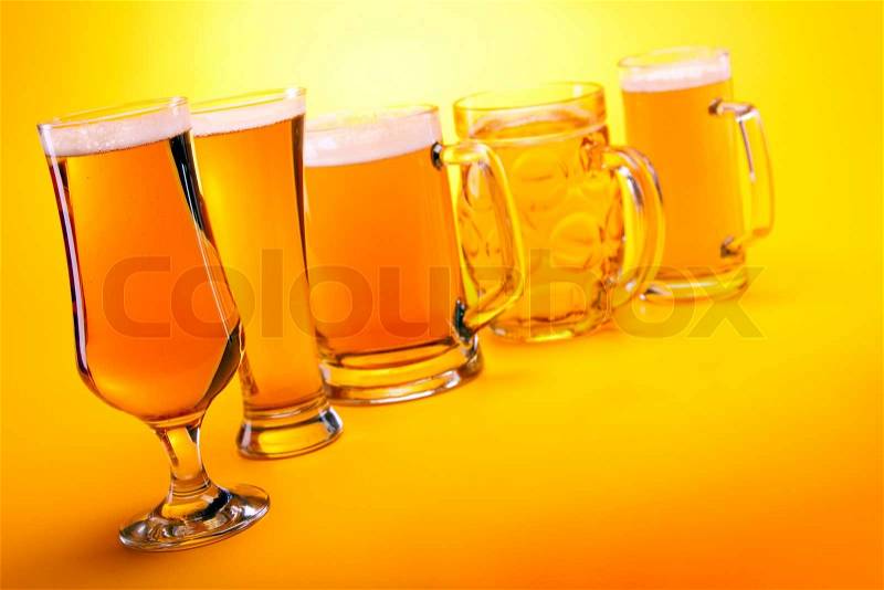 Perfectly chilled beer, in ideal yellow color, just for your table! Studio shots, stock photo