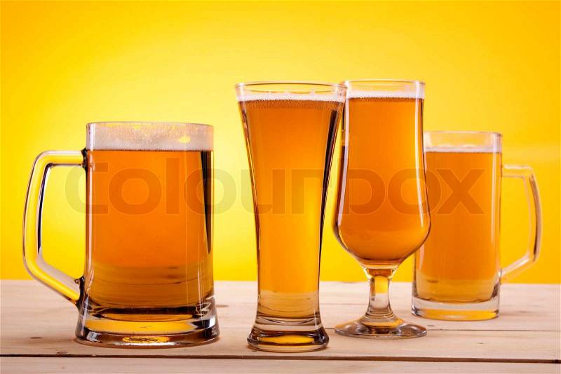 Perfectly chilled beer, in ideal yellow color, just for your table! Studio shots, stock photo