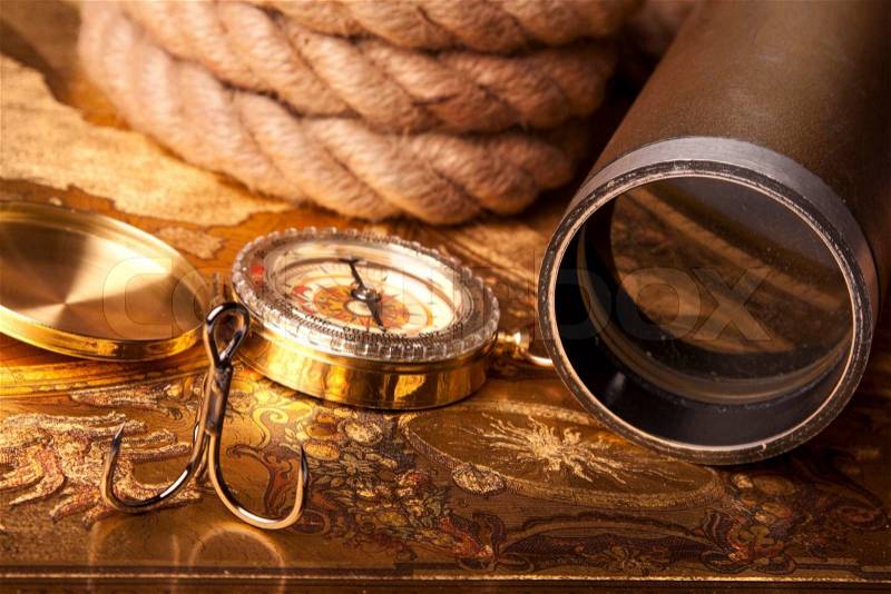 Vintage Golden Compass, navigation equipment, stock photo