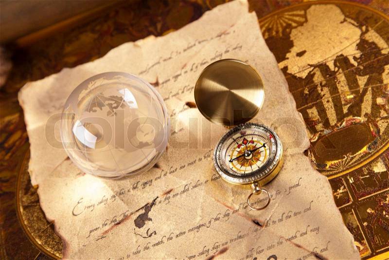 Vintage Golden Compass, navigation equipment, stock photo