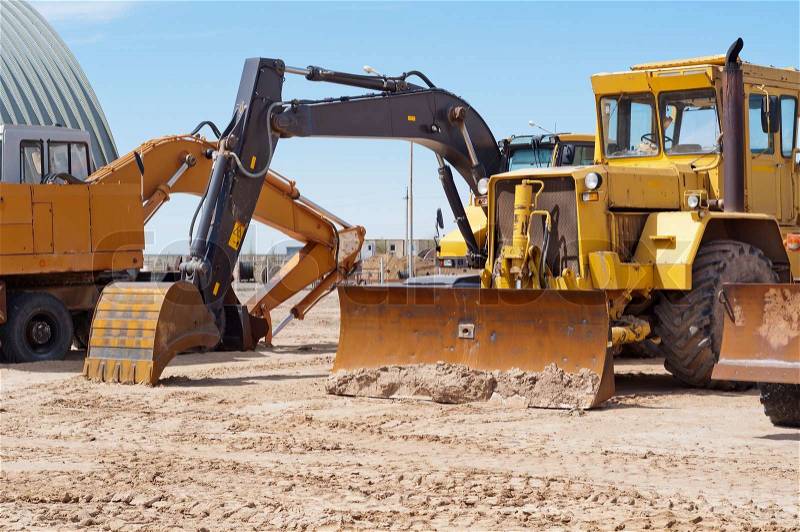 Construction equipment on a production site, stock photo