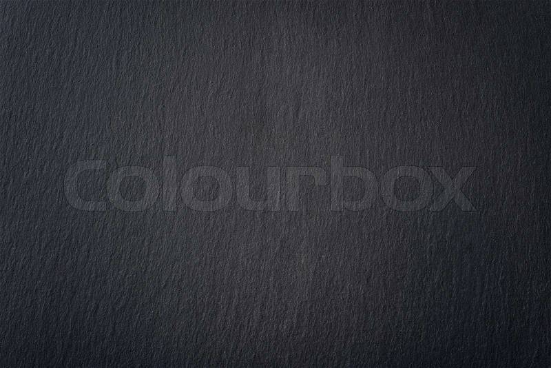 Black slate texture closeup. May be used as background, stock photo