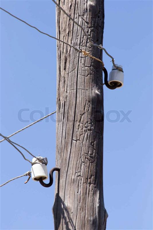 Wooden pole with electricity, stock photo