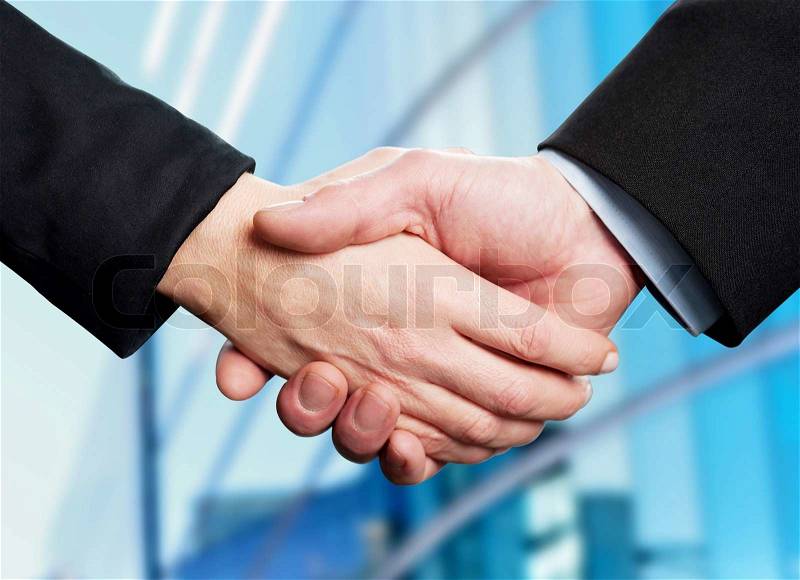 Business handshake, the deal Is finalized, stock photo