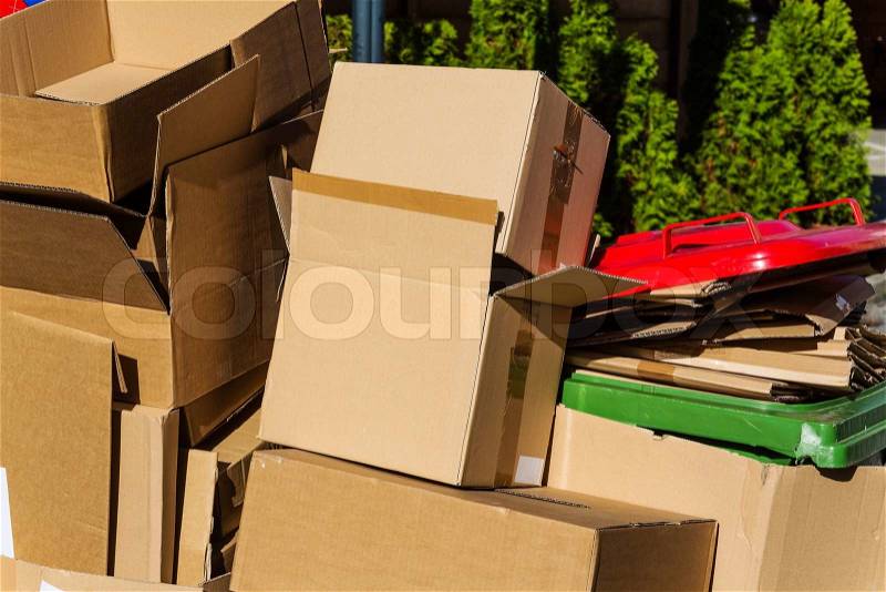 Empty cartons of packages waiting for transport to the waste paper collection. waste reduction through recycling okölogische, stock photo