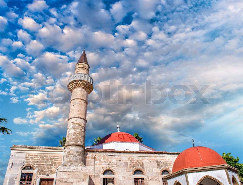 Old islamic church building with mosque and minaret tower in Kos island in Greece, stock photo