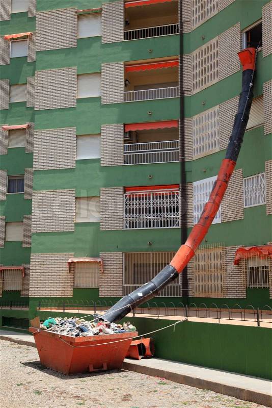 Waste pipe at an apartment building, stock photo