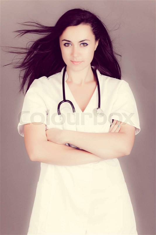 Portrait of a friendly female doctor. happy young smiling female doctor, stock photo