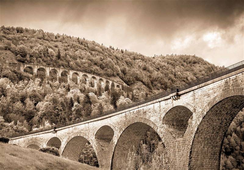 Two ancient bridges in the mountains of France, stock photo