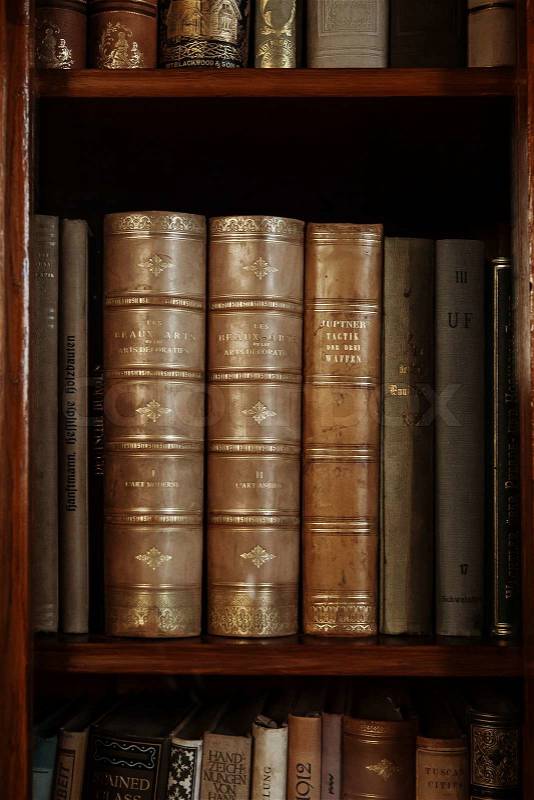 Historic books in a old library, stock photo