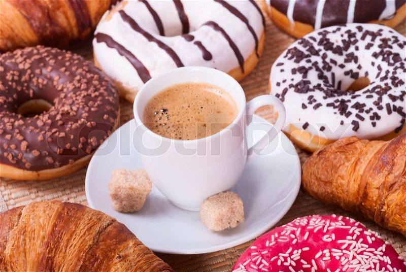 Breakfast with coffee donats and croissants. , stock photo