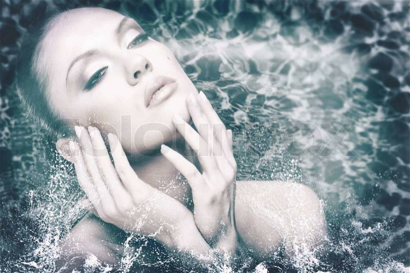 Beauty female portrait with water drops and foam, stock photo