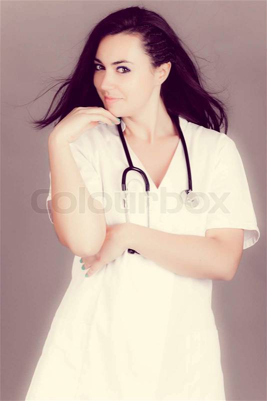 Portrait of a friendly female doctor. happy young smiling female doctor, stock photo