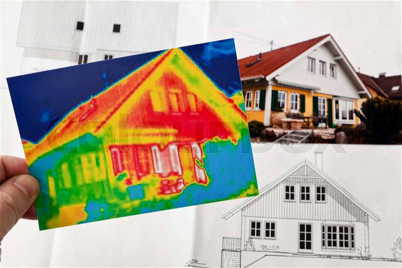 Saving energy through thermal insulation. house with thermal imaging camera photographed, stock photo