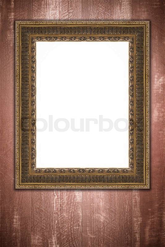 Old picture frame on vintage wood wall, stock photo
