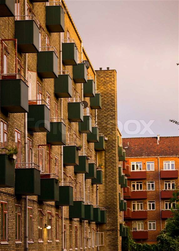 Slanting image of an apartment building in Copenhagen at dusk, stock photo