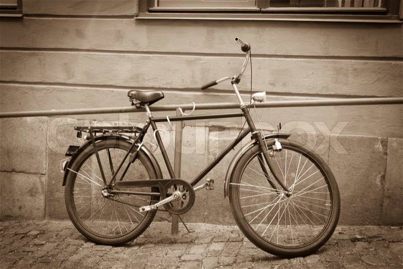 Classic vintage retro city bicycle in Stockholm, Sweden, stock photo