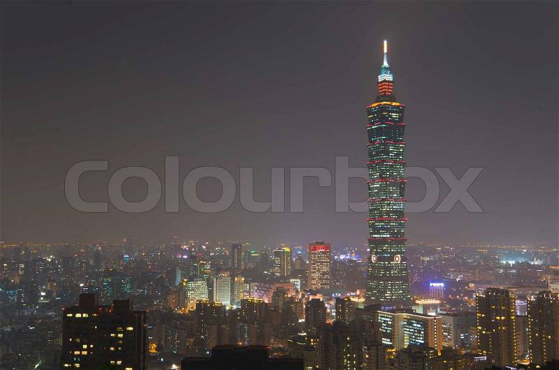 A beautiful Evening of Taipei city and Taipei 101 with silhouette of a mountain in front, stock photo