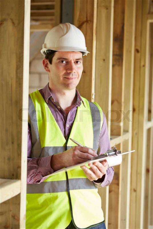 Building Inspector Looking At New Property, stock photo