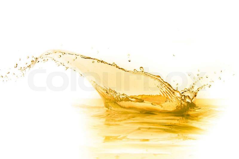 Orange juice splash isolated on white background, stock photo