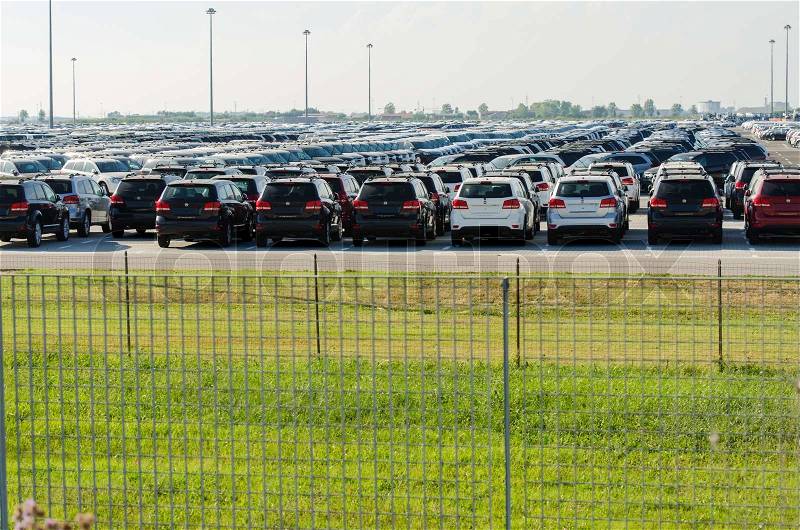 TUSCANY, ITALY - 27 June: New cars parked at distribution center in Tuscany, Italy. This one of biggest distribution centers in Italy, stock photo