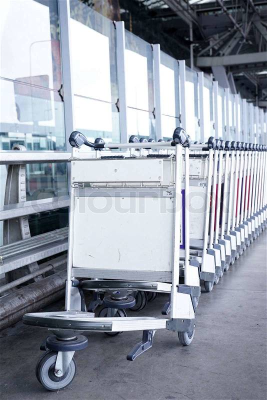 Trolleys luggage in a raw in airport, stock photo