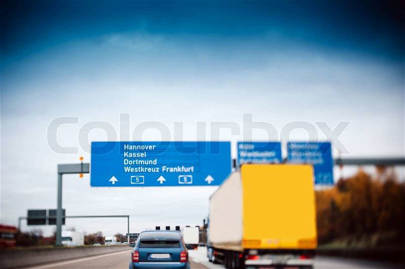 Busy highway autobahn road traffic in Germany - Tilt shift lens used to accent motorway and to emphasize the speed vision, stock photo