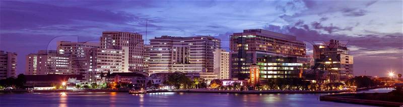 Panorama Siriraj hospital.Atmosphere after the sun sets in the evening. Light on the building at night, stock photo