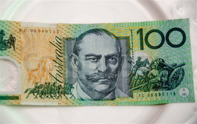 Australian banknote on white plate, stock photo