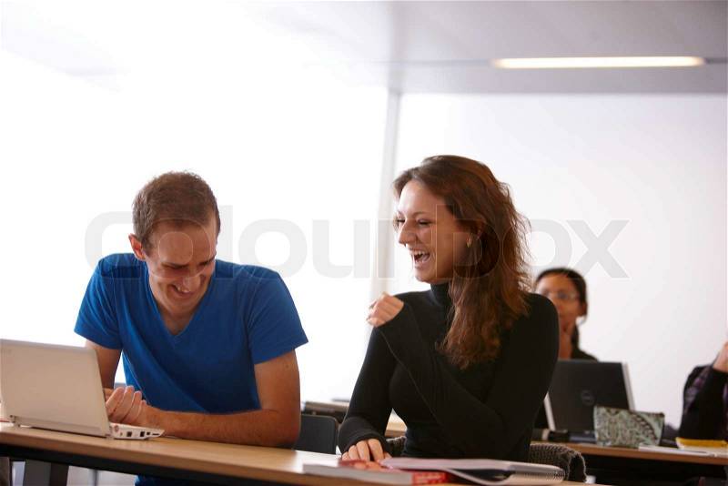 College students exchanging ideas, stock photo