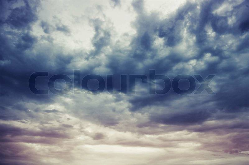 Dark blue stormy cloudy sky natural photo background, stock photo