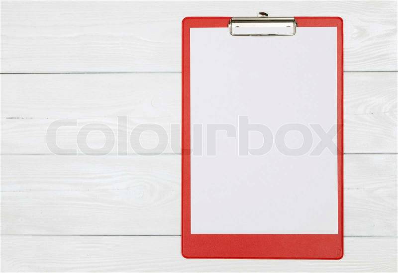 Red document holder on white wood, stock photo