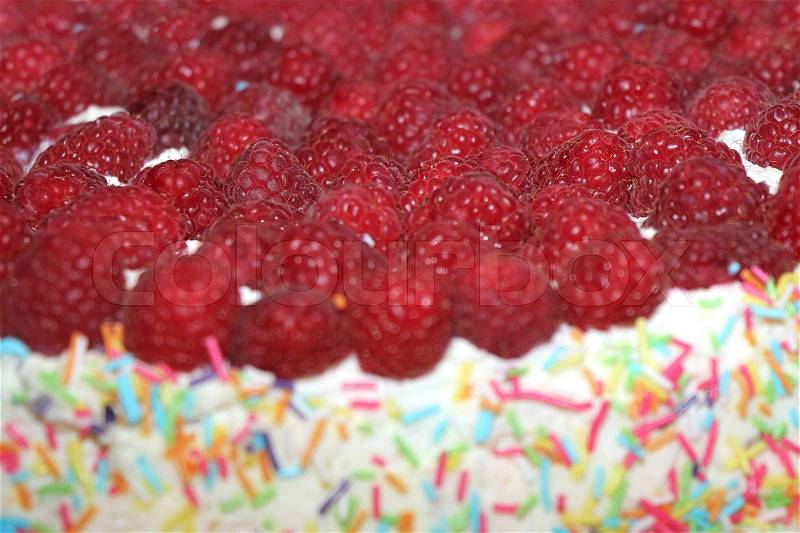 Raspberry cake close up purposely blurred , stock photo