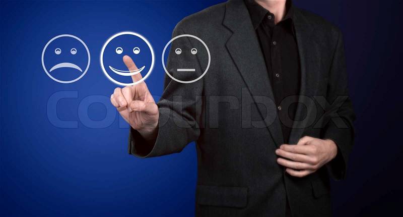 Businessman touching screen with customer service evaluation form, stock photo