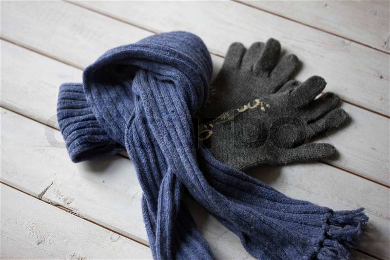 Knitted scarf and winter gloves, stock photo