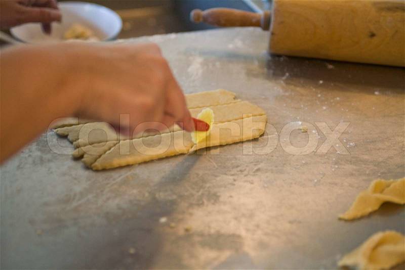 Making of a traditional Christmas biscuit, stock photo
