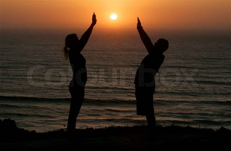 Stock image of \'meditation, sun, silhouette\'