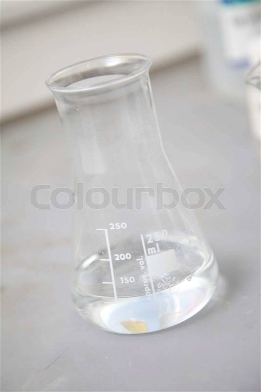 Chemical product in a glass flask, stock photo