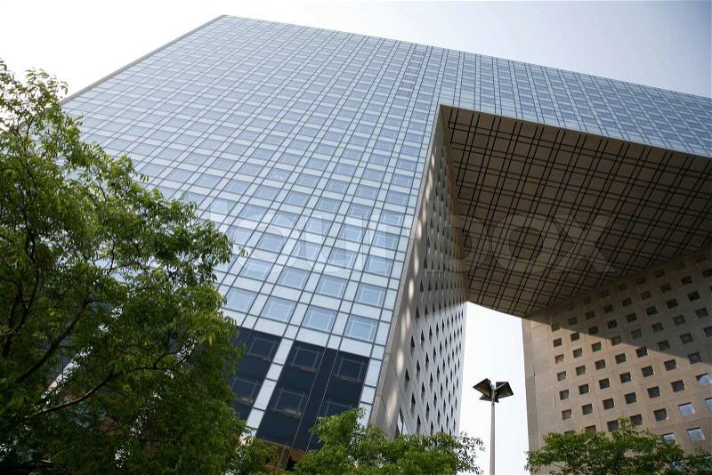 Futuristic corporate office building - La Defense, Paris, stock photo