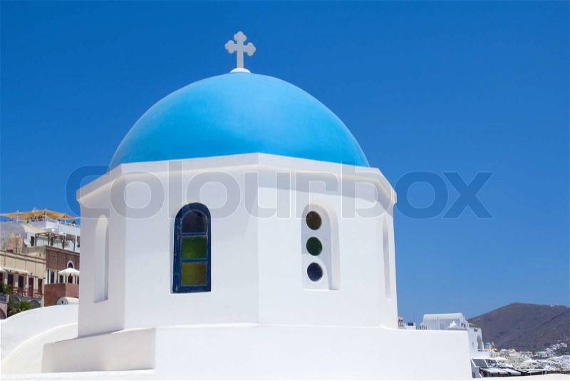 Greek church in Oia village on island of Santorini, stock photo