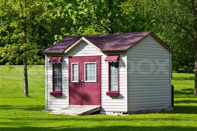 Storage shed in the backyard, stock photo